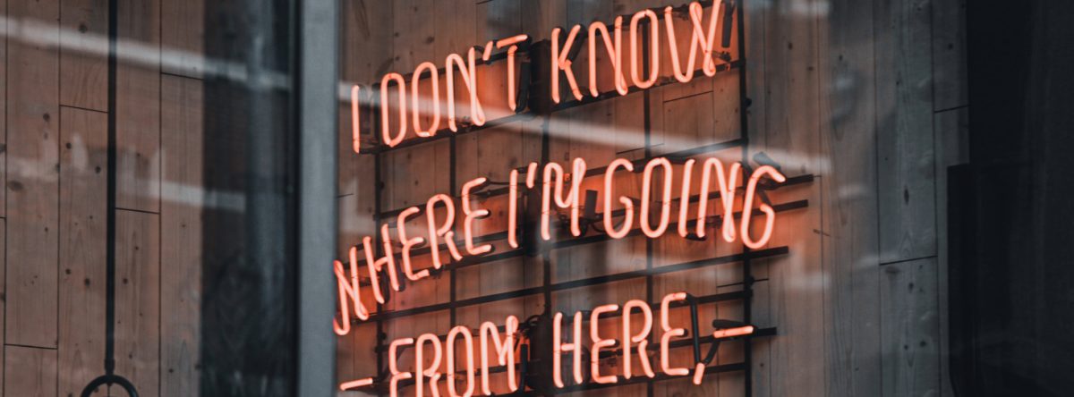 A sign in a window in lights says, I don't know where I'm going from here